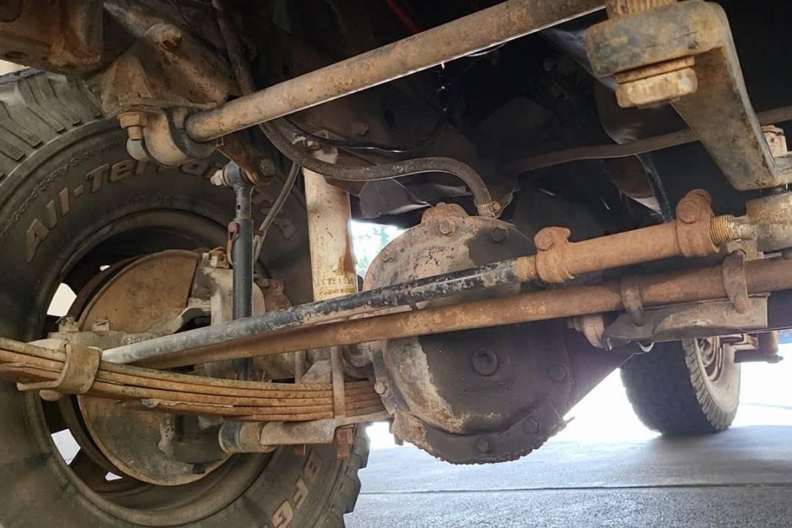 Jeep CJ rusted and worn out steering under jeep